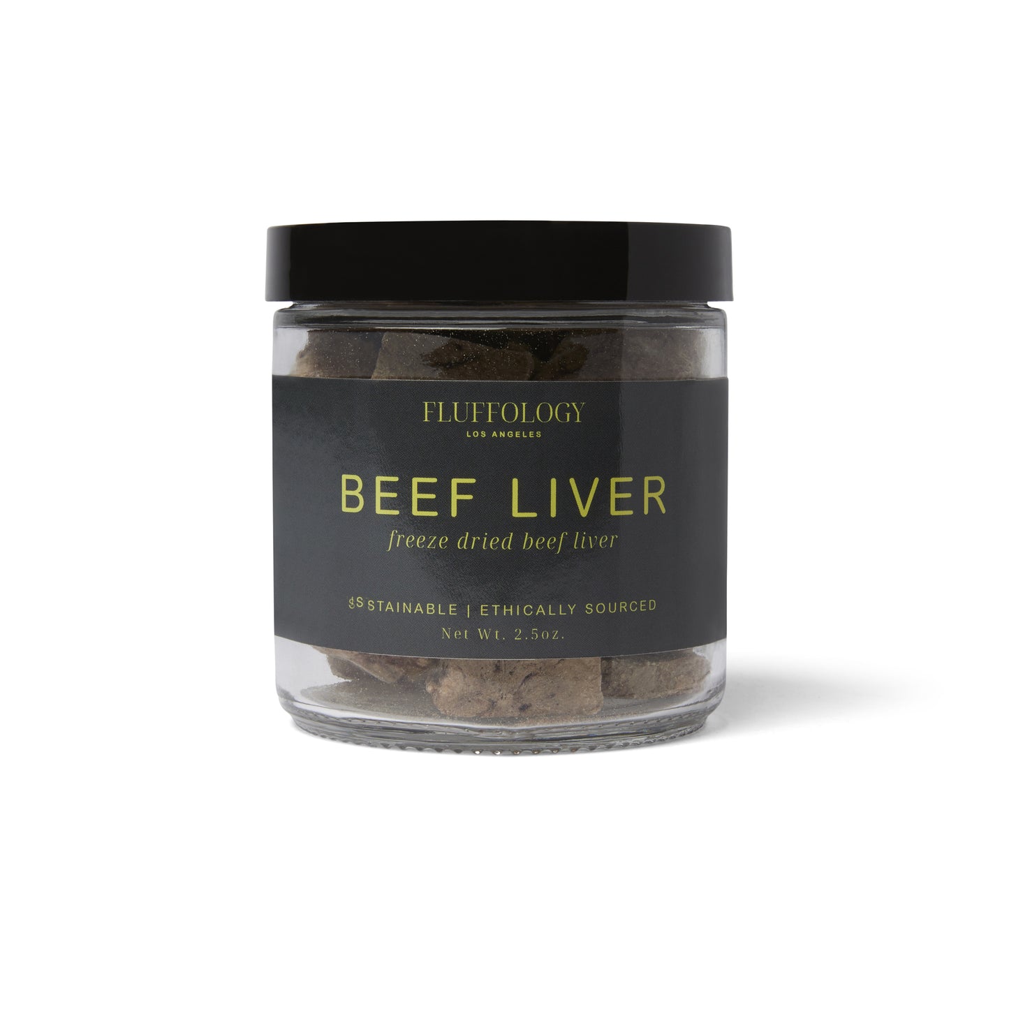 A clear glass jar containing freeze-dried beef liver dog treats, with a black label that includes the brand name 'Fluffology' and the product name 'BEEF LIVER'.